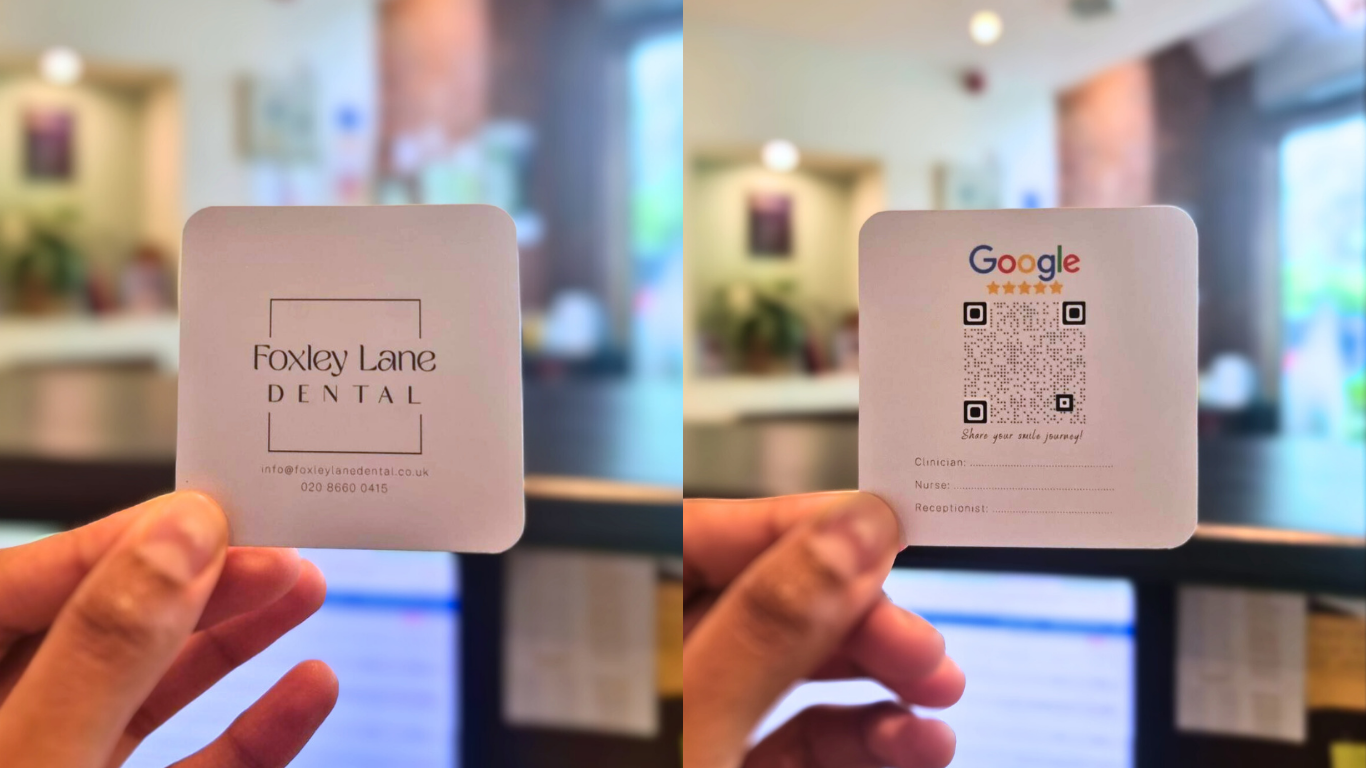 The front of the business card appears normal, while the backside shows a QR code to get reviews on Google.